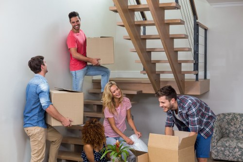 Professional flat removals planning in Peckham with boxes and moving van