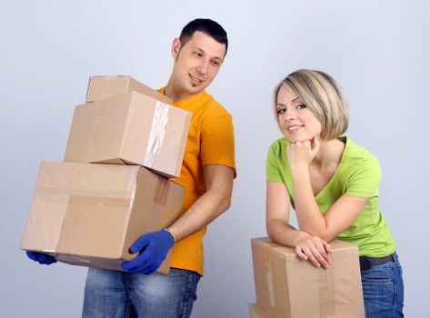 Packing supplies and organized boxes for a Peckham home move