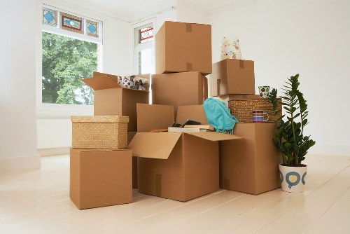 Careful packing materials and labelled boxes prepared for a Peckham relocation