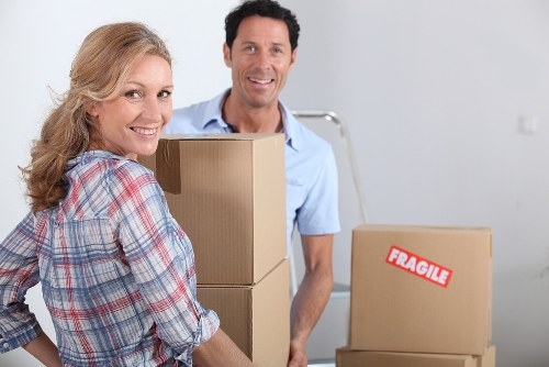 Removal team handling furniture during a booking