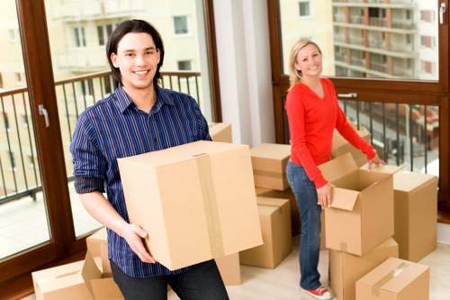 Student moving checklist and packed boxes in a Peckham home