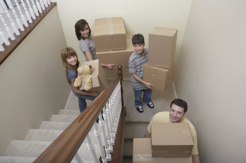Local office movers transporting furniture through Peckham